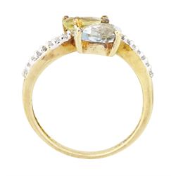 9ct white gold quartz, aquamarine and diamond crossover ring, single pear cut aquamarine and yellow / green quartz, with diamond set shoulders, Birmingham 2004