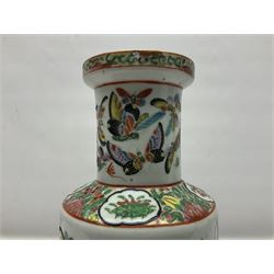 19th century Chinese Canton vase of slender baluster form, decorated with butterflies and floral panel to the neck, H30cm