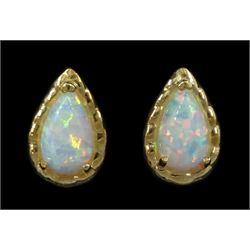 Pair of 9ct gold opal stud earrings, stamped