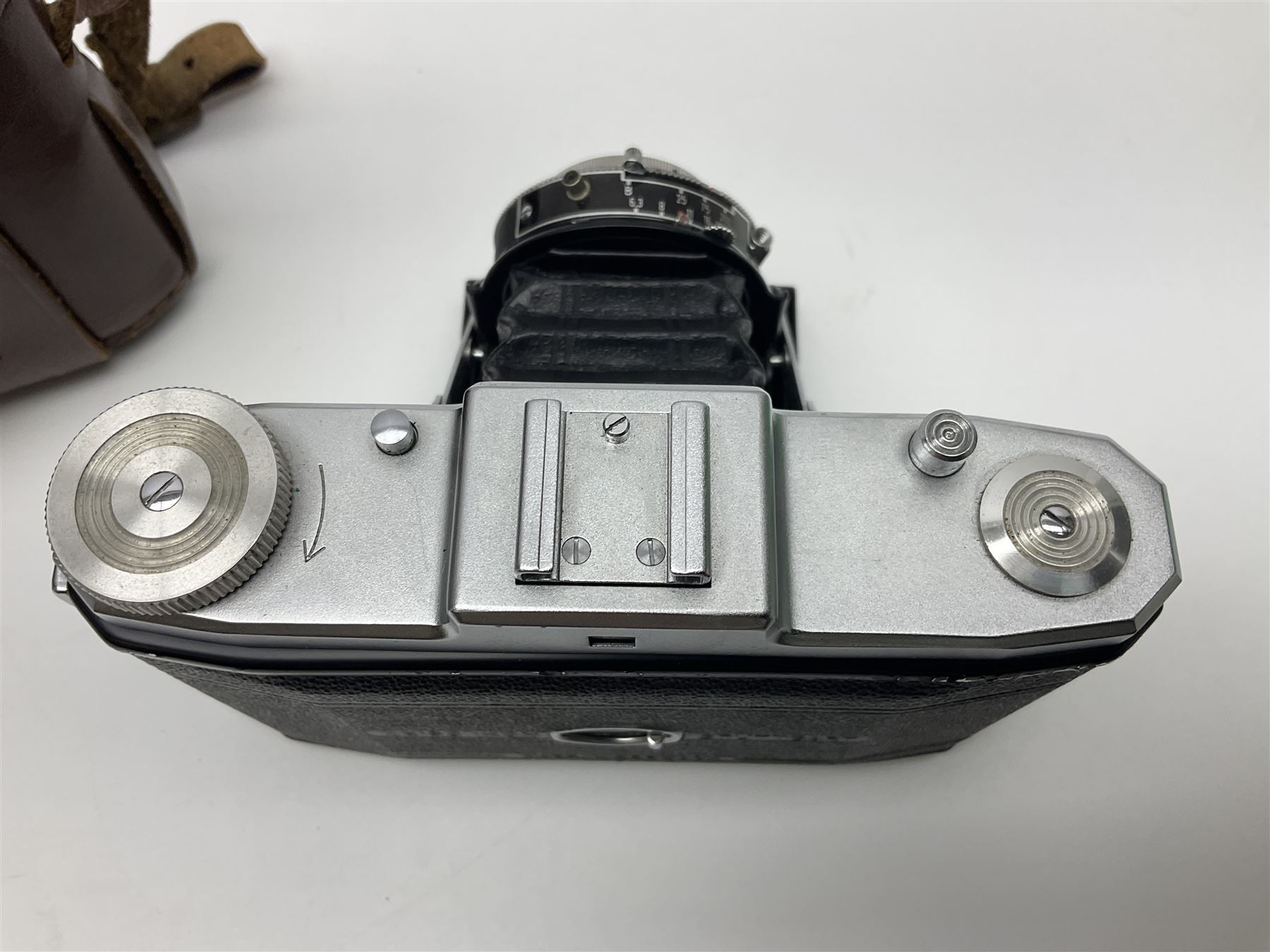 Canon EOS 50e camera body, serial no 8305671 with 'Canon Zoom EF 35-135mm 1:4-5.6' lens together with Halina 35X super camera body, with 'Halina Anastigmat f.c. 1:3.5 f=45mm' lens and other camera equipment 