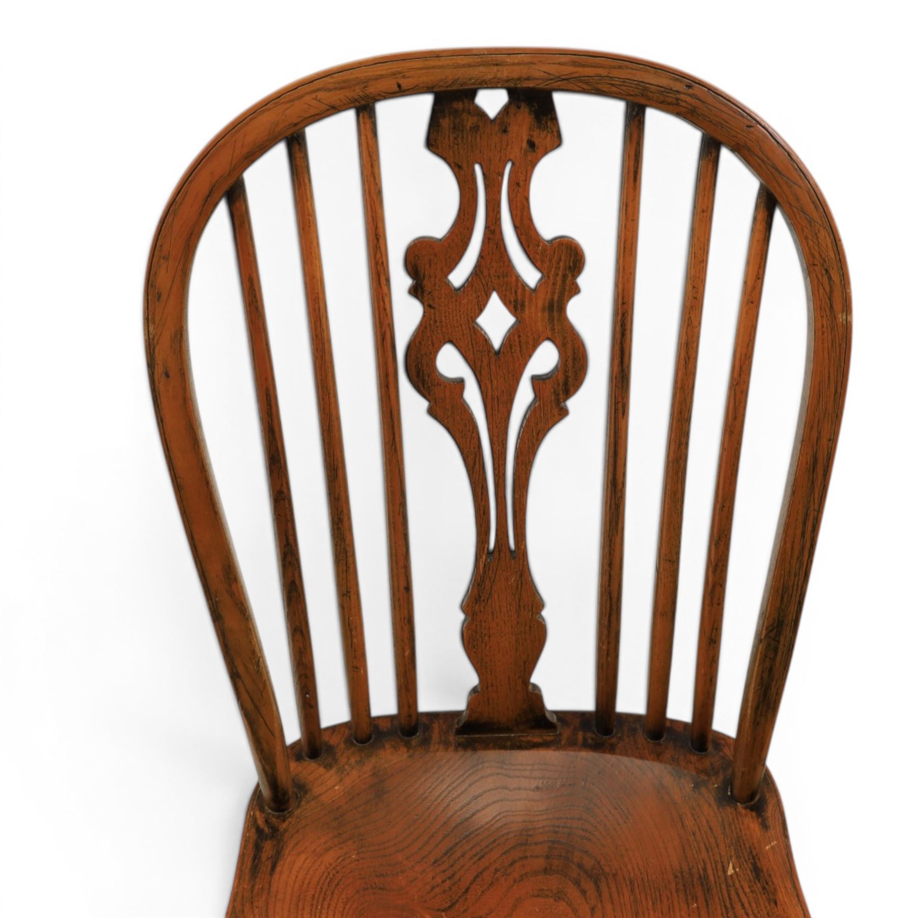Set of six elm Windsor chairs, saddle seats with crinoline stretchers