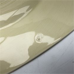 Clarice Cliff Bizarre for Newport Pottery Orange Roof Cottage pattern plate, circa 1932, hand painted with a stylised cottage and bridge landscape with yellow, orange and black banding, black printed mark beneath, D22cm 