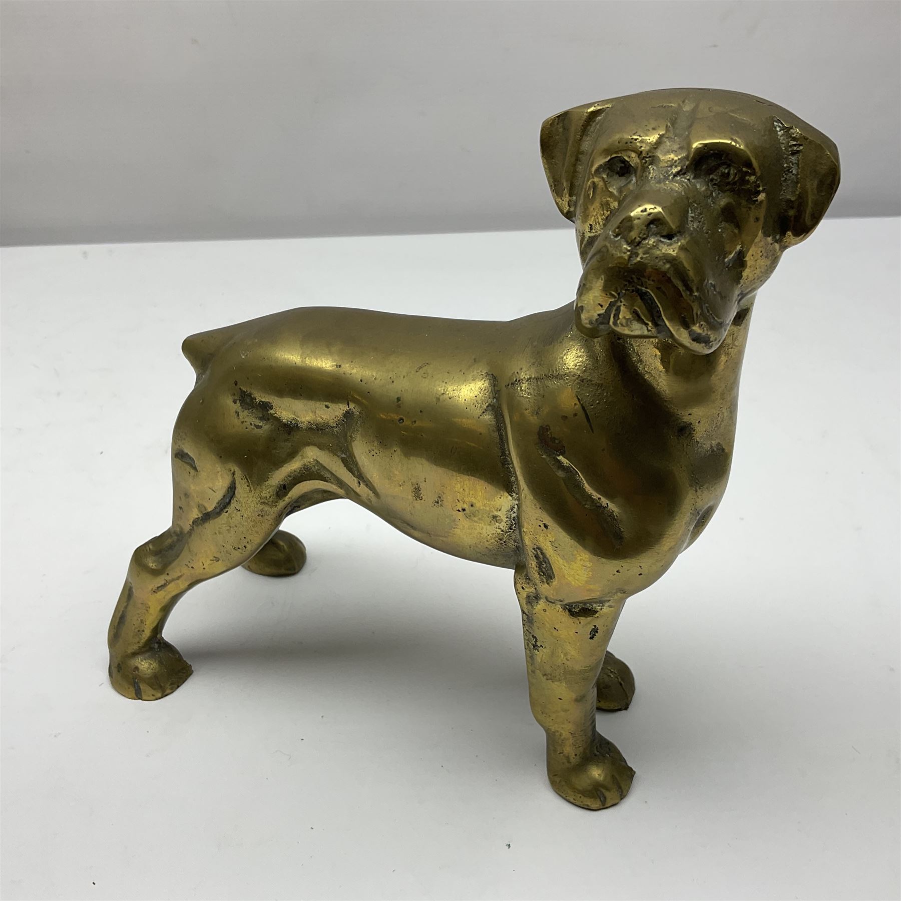 Three Border Fine Arts figures including Boxer with Pups, Capodimonte figure of a drunken pirate, and a brass dog (5)