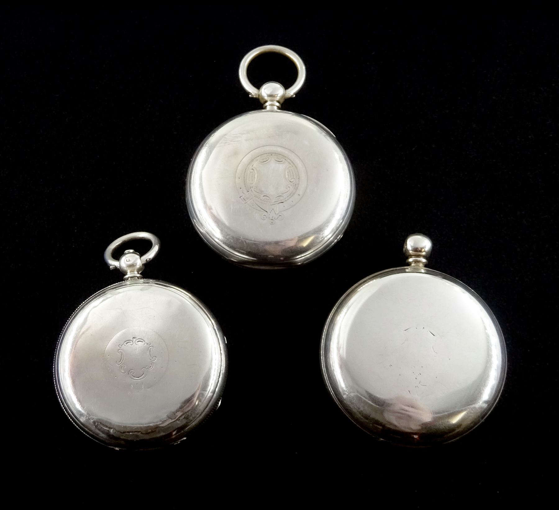 Victorian silver open face English lever fusee pocket watch by Thomas Russel & Son, Liverpool, No. 67496, engraved balance cock with diamond endstone, white enamel dial with Roman numerals and subsidiary seconds dial and two other similar Victorian silver pocket watches, one by M Michael, Edinburgh, all hallmarked (3) 