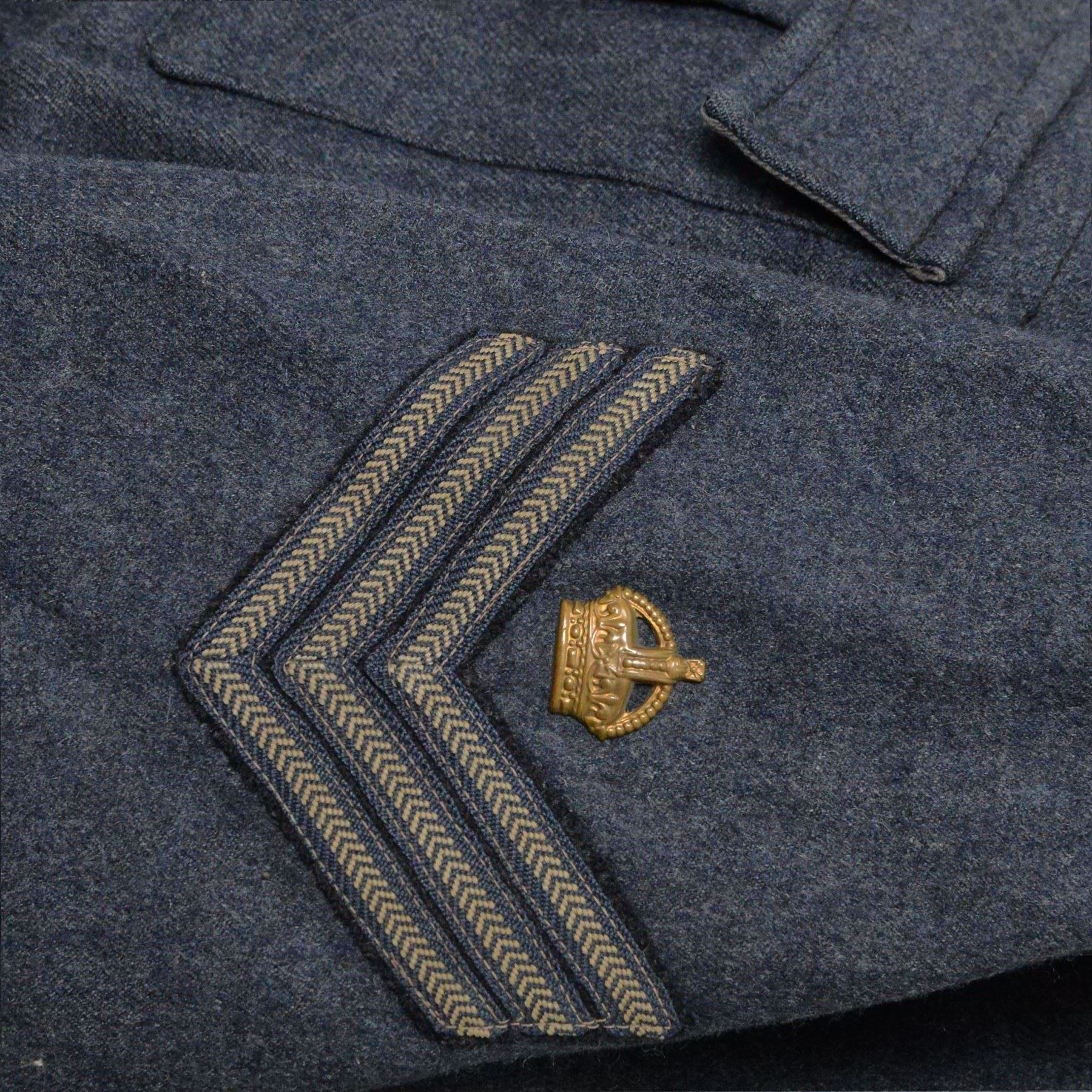 WWII Royal Air Force battle dress blouse, belonging to Flight Sargent Colin Scott 3011422, dated 1945, tailors label for M & N Horne Ltd 1945, Size No 7, blue cloth, Signaller cloth brevet, wireless officers patch to right sleeve and braid sergeant stripes to both sleeves, together with his flight log book, postings & Movements, Royal Air Force Service and Release Book, photographs etc  