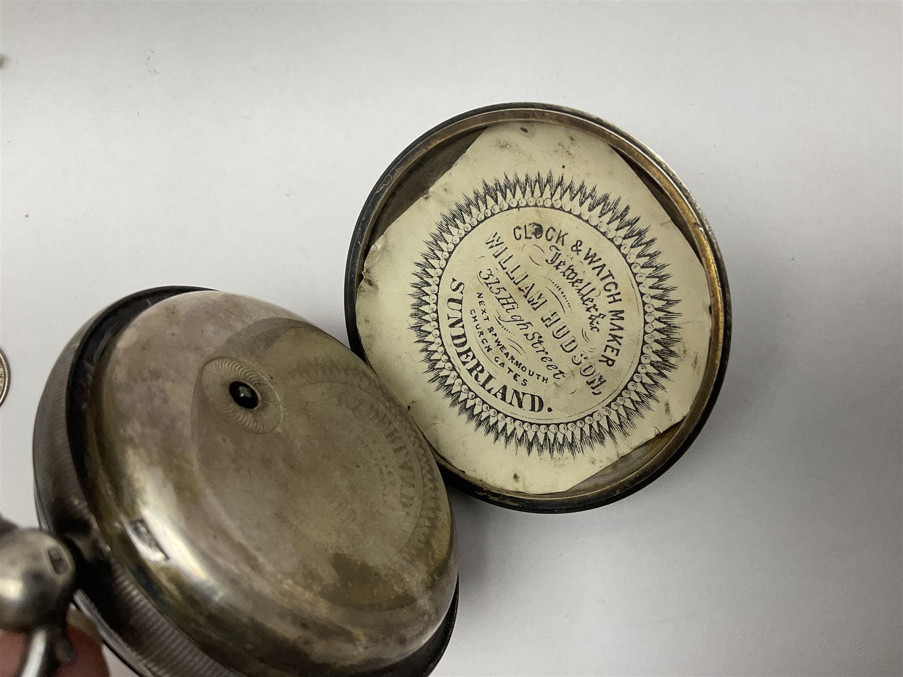 Victorian silver open face fusee lever pocket watch by D A Olswang, Sunderland, No. 7904, white enamel dial with Roman numerals and subsidiary seconds dial, case hallmarked Chester 1895 and a watch chain with silver fob and coin

 

