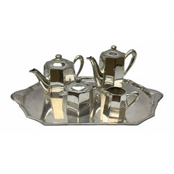 French Ercuis silver plated Art Deco tea and coffee service, comprising coffee pot, teapot, lidded sucrier and jug all with canted bodies stamped Ercuis beneath, housed on a similar twin handled silver plated tray, L50cm