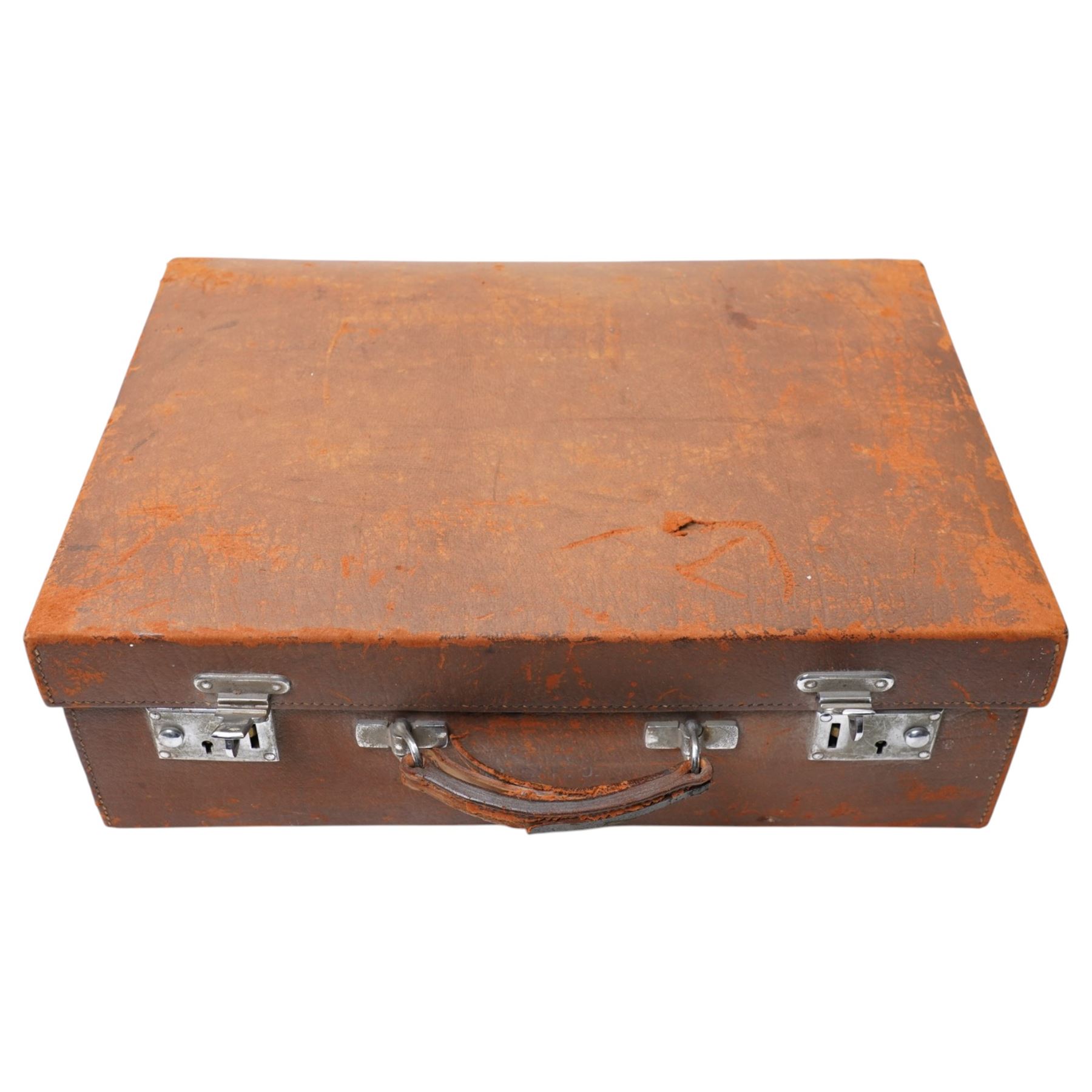  Leather dressing case with silver mounted brushes and glass bottles engraved with the Starkey crest W49cm London various dates circa 1930, Maker G H James & Co