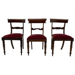 Seven early 19th century mahogany dining chairs - set six side chairs with scroll carved middle rails (W46cm), and a carver elbow chair with rope twist middle rail