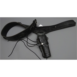  Black leather Mexican single gun rig, belt tooled with scrollwork and chrome buckle, L130cm  