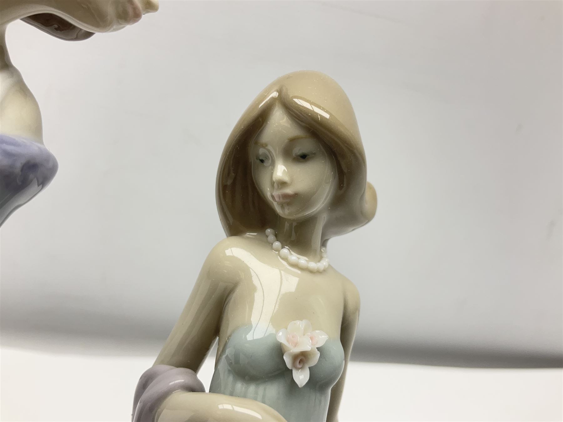 Three Lladro figures of ladies comprising 'The Flirt' model no 5789, 'Ingenue' model no 5487 and 'Carefree' model no 5790, all with boxes