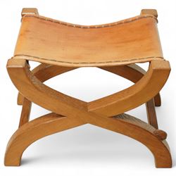 Rabbitman - curved x-framed stool with slung leather seats, adzed throughout the frame wit...