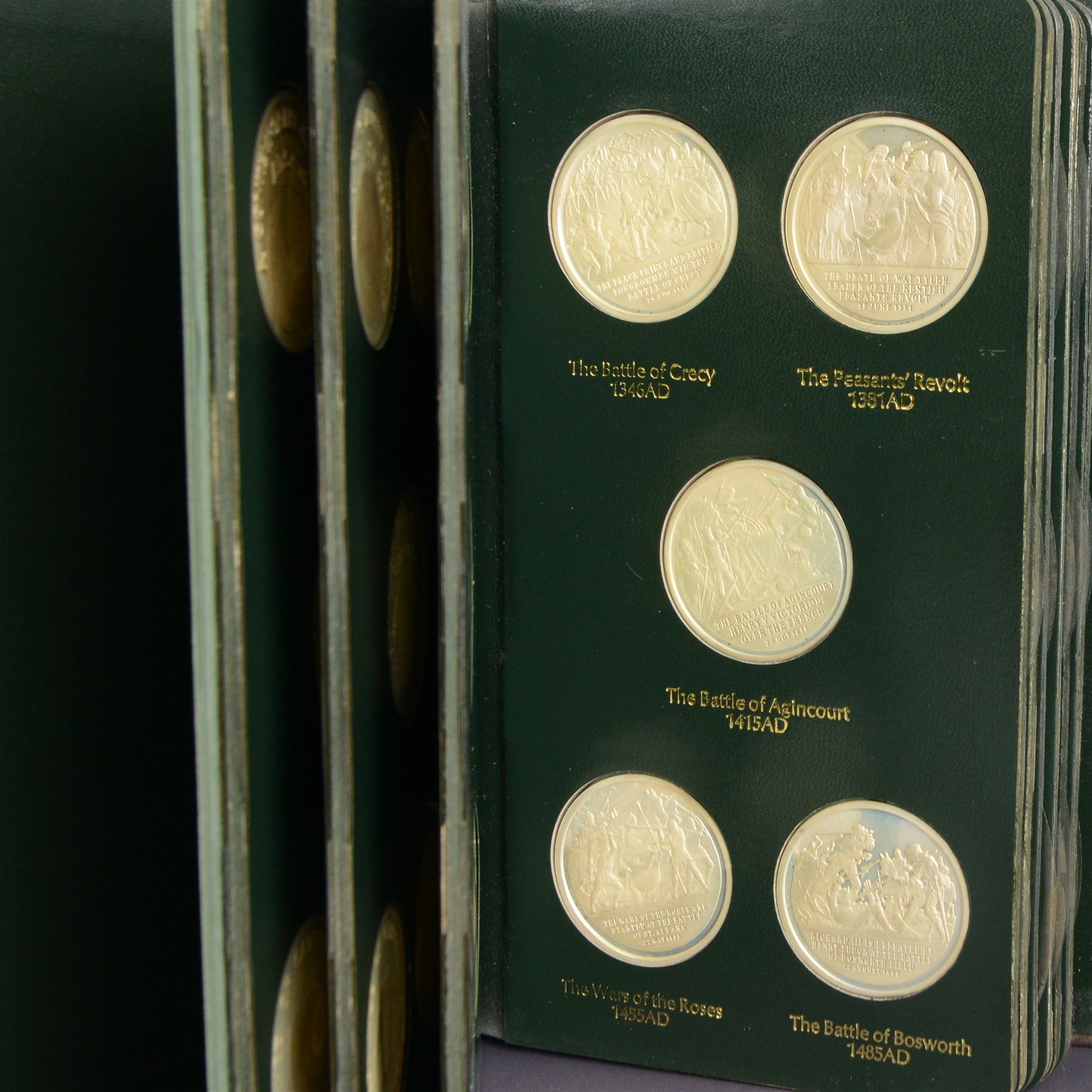 Limited Edition Danbury Mint 'History of the English Speaking Peoples' complete set of fifty silver medallions, each depicting historical figures and scenes from Julius Caesar Lands 55BC to Second World War 1939AD, contained within leatherette folder with personalised presentation to cover and interior, no. 2780/7500