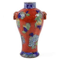 Chinese vase, of baluster form,  with floral decoration on an orange ground, with partial mark beneath, H22cm  