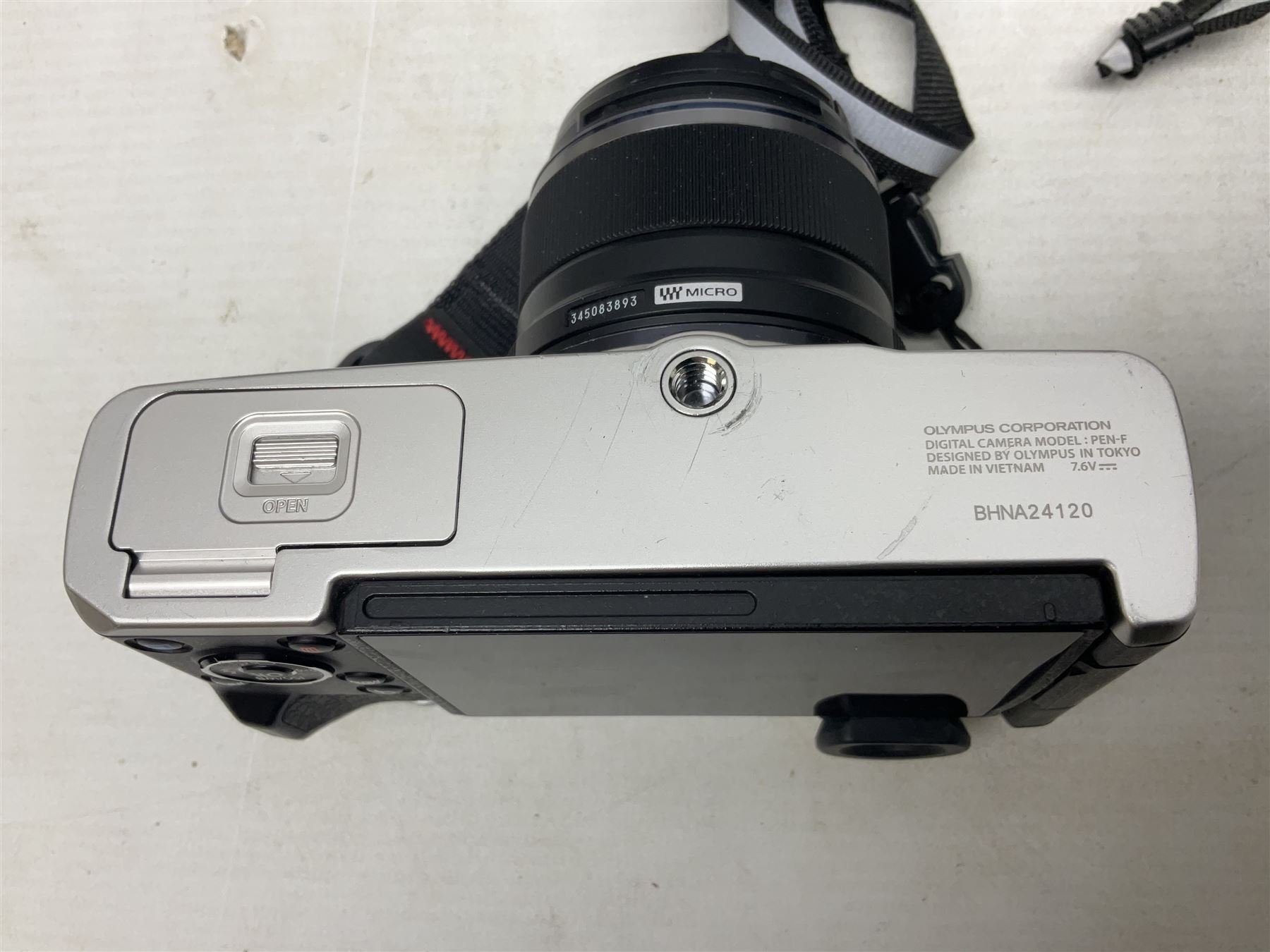 Olympus PEN-F camera body, with 'Olympus M- Zuiko Digital 25mm 1: 1.8' lens,  'Olympus M- Zuiko Digital 75-300mm 1: 4.8 - 6.7' lens and  'Olympus M- Zuiko Digital 17mm 1: 1.8' lens, with original box, together with Lowepro camera bag