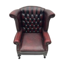 Thomas Lloyd - Georgian style wing back armchair, upholstered in buttoned leather