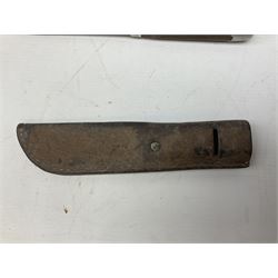 Burmese dha dagger with 15cm steel blade, white metal ferrule and horn handle, in white metal and filigree scabbard L30.5cm; a Burmese long bladed knife with horn handle and brass mounted teak scabbard; and another Eastern dagger in sheath (3)