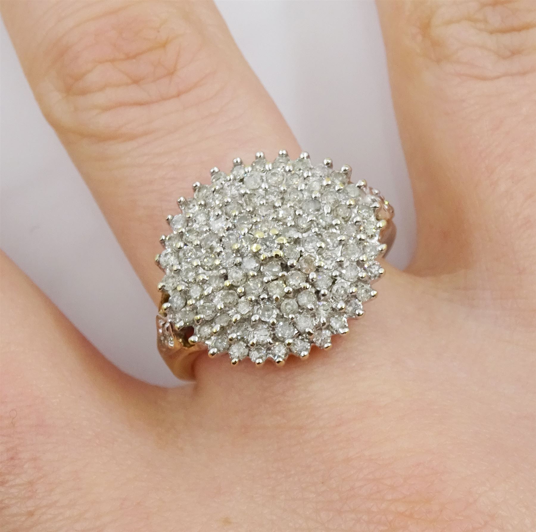 9ct gold diamond chip cluster ring, with diamond set shoulders, hallmarked, total diamond weight 1.00 carat