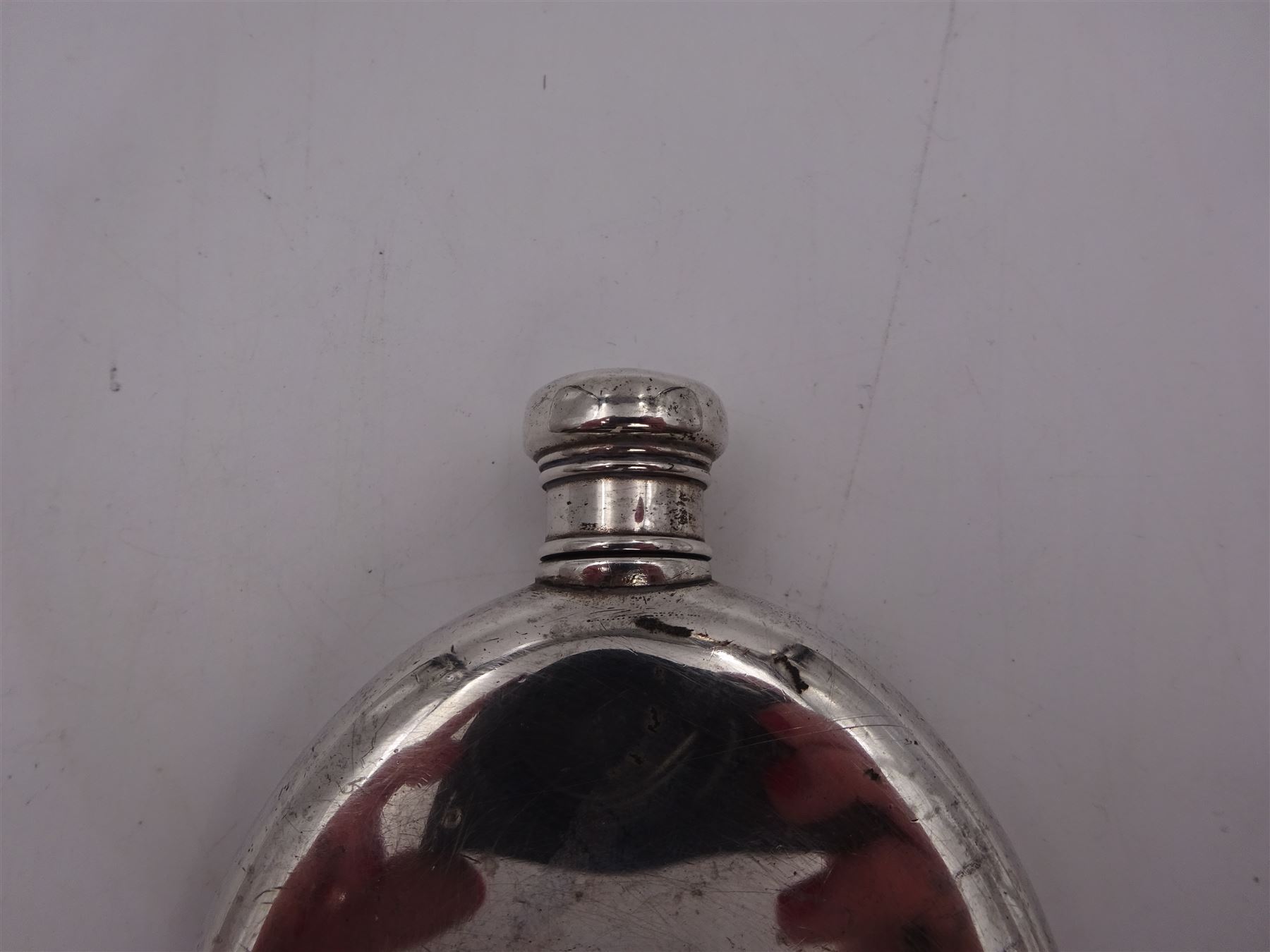 Tiffany & Co silver hip flask, of oval form with screw cap, stamped Tiffany & Co  26503327 Sterling Silver beneath, H11.5cm