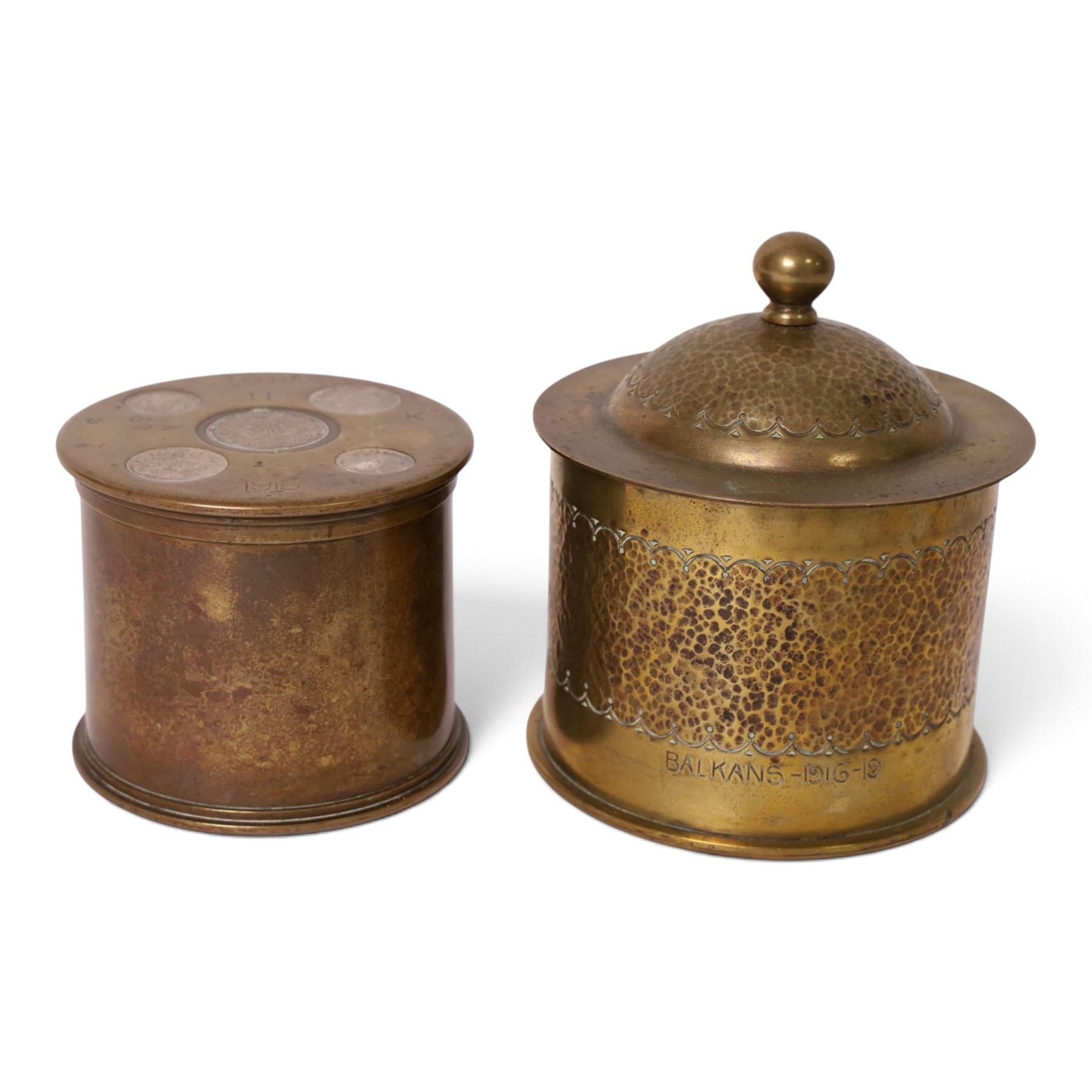 Three WWI trench art tobacco jars including an example with the lid embedded with silver rupees, largest H15cm 