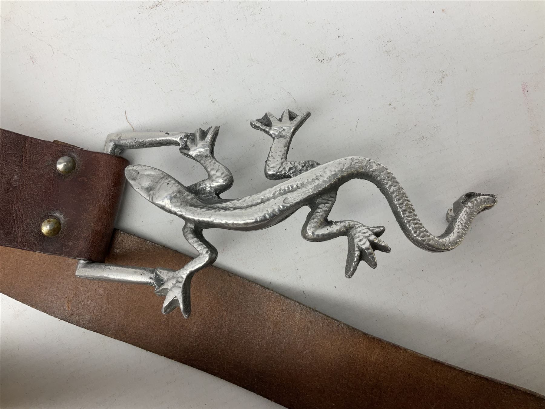 Guy Taplin (b.1939) leather belt, with lizard buckle, belt L91cm