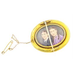 Victorian gold hinged locket brooch, the monogrammed black enamel front revealing hairwork glazed locket and an Victorian 18ct gold Etruscan design brooch