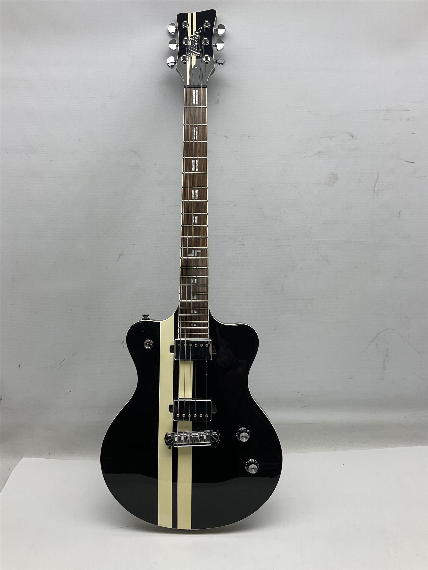 Italia Maranello Speedster electric guitar in black and white, serial no.013972; L99cm; in Italia soft carrying case; together with a boxed TGI 3491 guitar stand