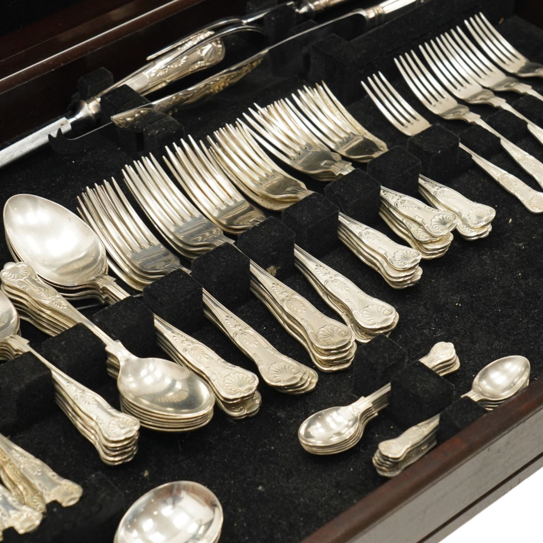 Canteen on stand containing a twelve-place set of King's pattern silver plated cutlery