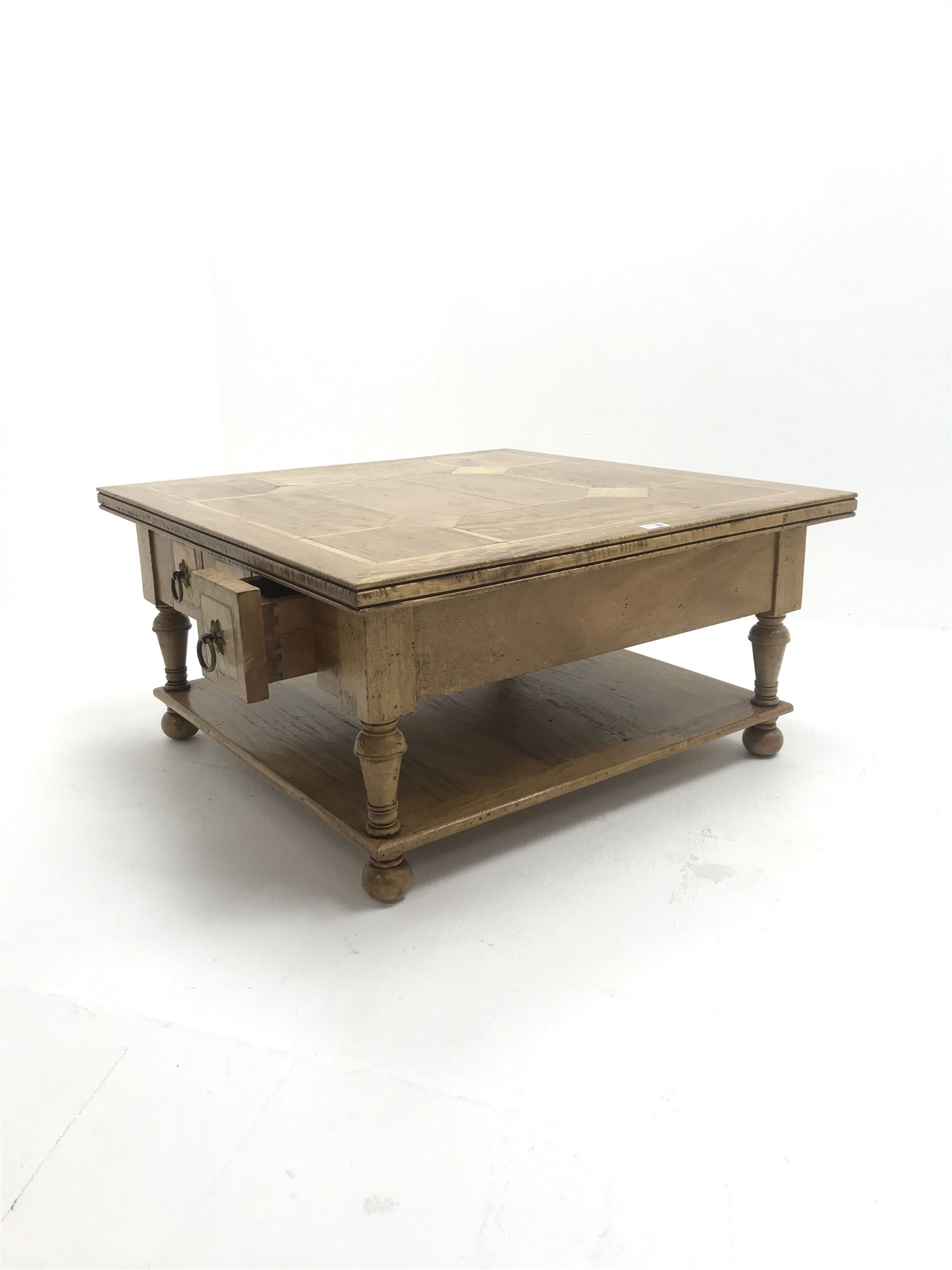 Teak and tile inset square coffee table, six drawers, baluster supports joined by undertier 