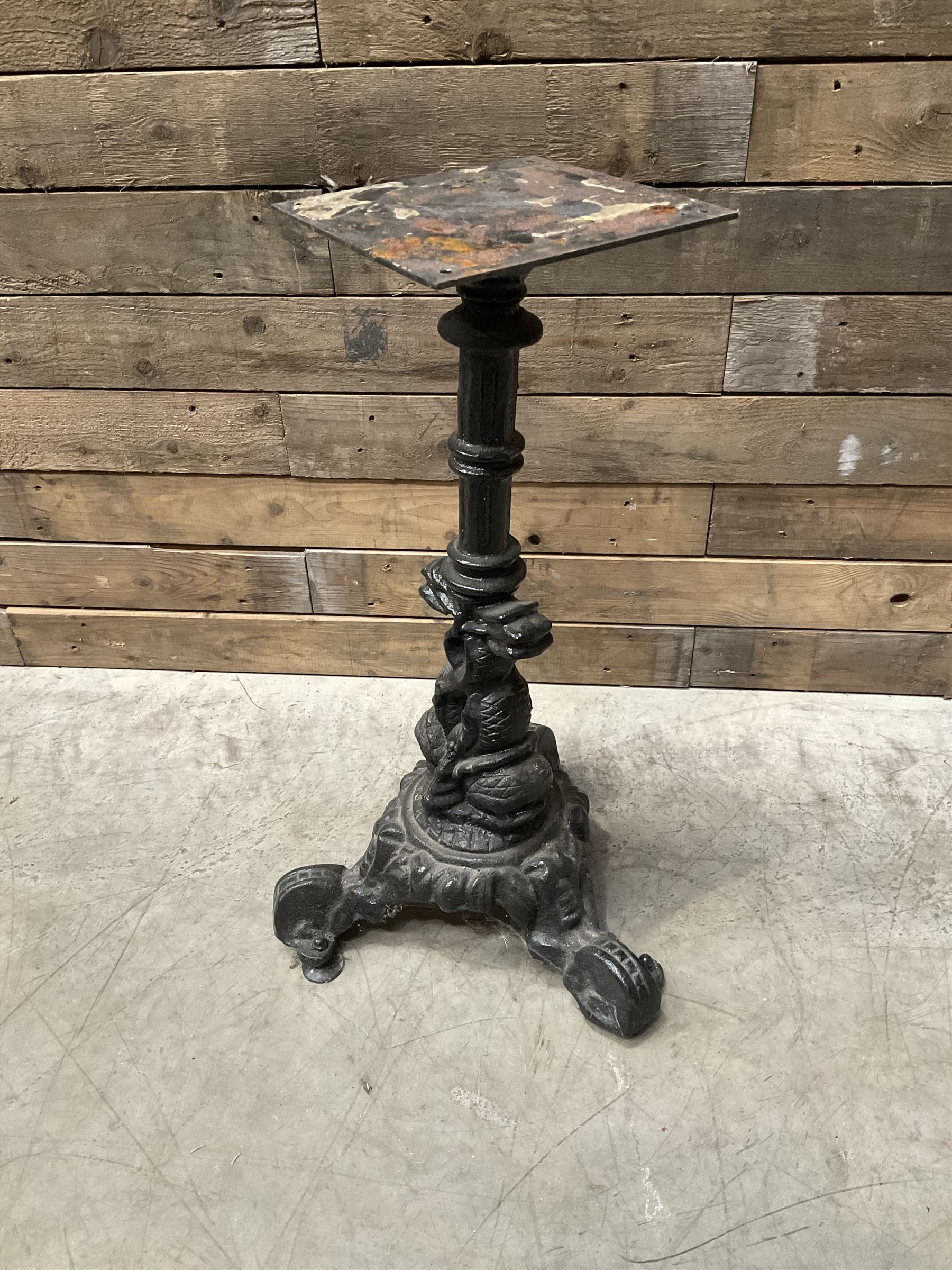 Cast iron Britannia circular pub table, and two pedestal cast iron bases (3)
