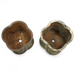 Matched pair of 20th-century cast iron neoclassical style planters, scalloped form with ornamental swag motifs in relief, one planter, probably later, 26cm wide x 22cm high, 29cm wide x 24cm high 