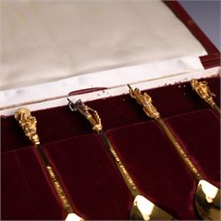 Set of twelve 'The Tichborne Collection' silver gilt spoons, each with fig shaped bowls, the finials depicting different historical figures including Queen Elizabeth, Hector of Troy and Saint Peter, hallmarked Birmingham Mint 1978, in fitted case