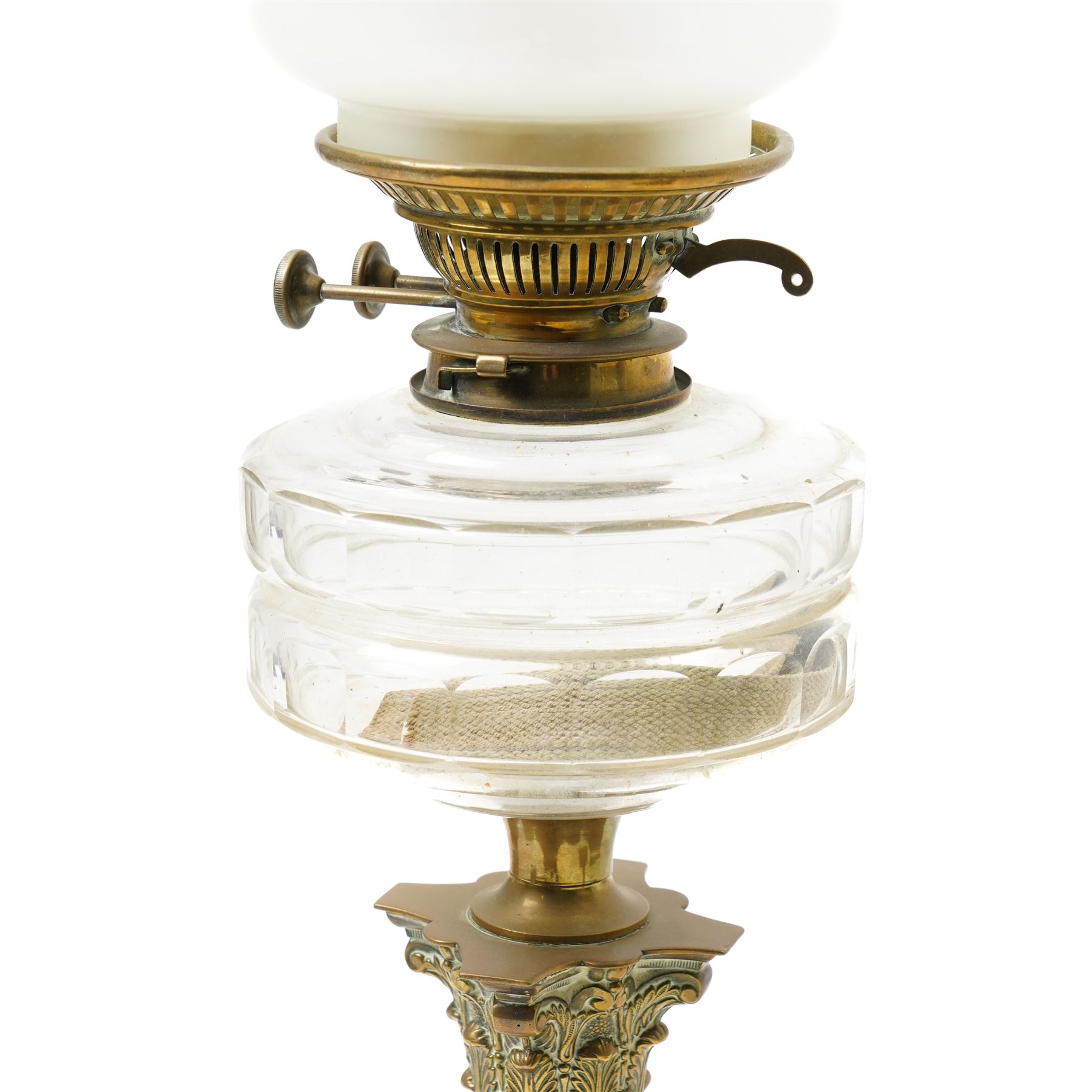 Pair of Victorian table oil lamps with clear glass reservoirs on brass Corinthian columns and stepped square bases with chimneys and etched glass shades H71cm overall