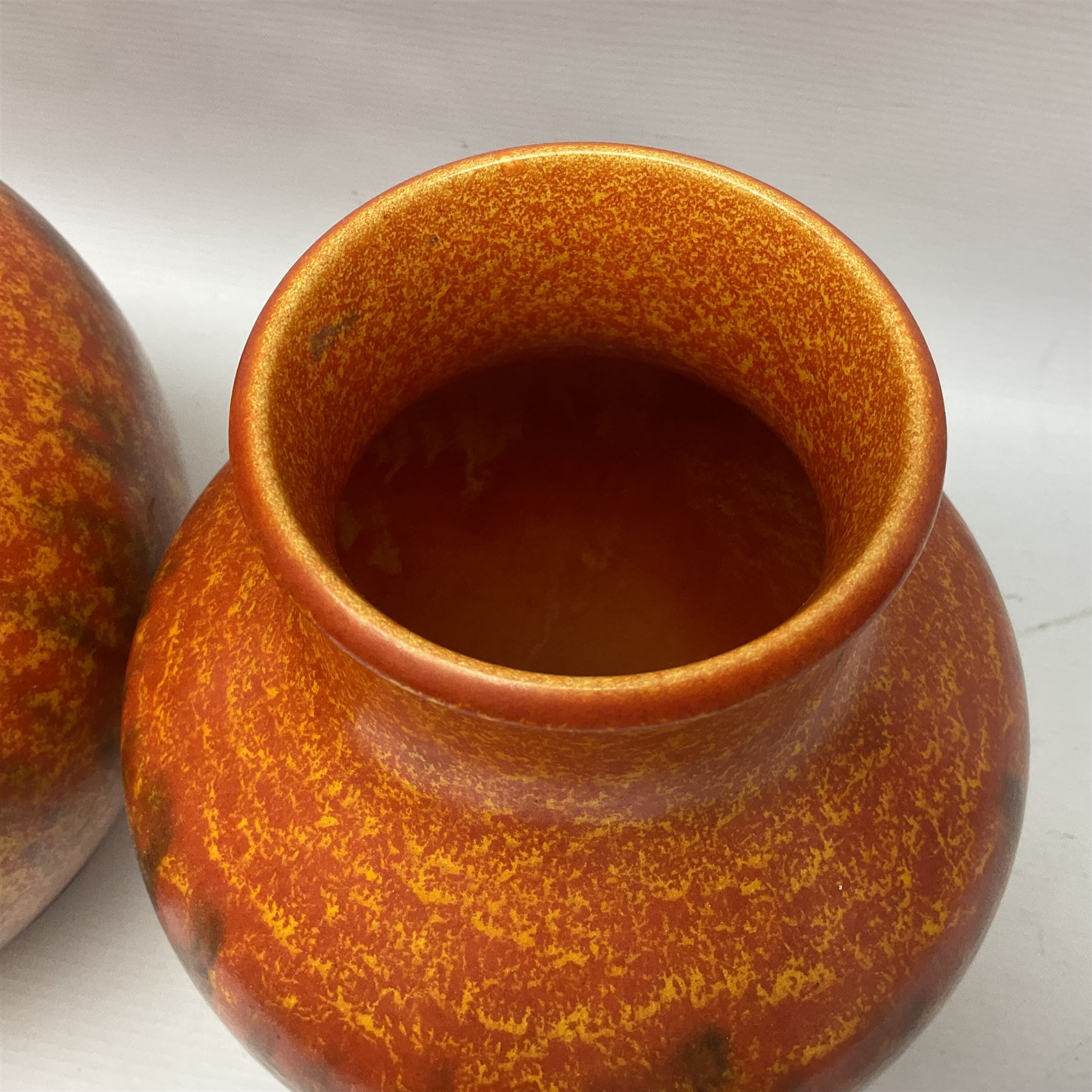 Two Pilkington's Royal Lancastrian vases of baluster form decorated in orange Vermillion, larges H27cm