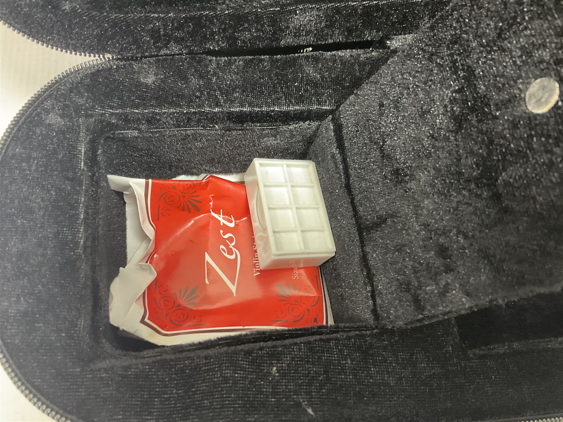 Zest full size pink violin, with a solid wood body and maple head, with matching pink bow and two further bows, in a hard case Length 60cm