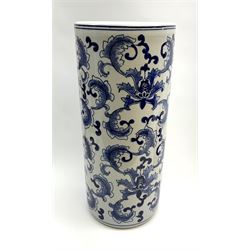 A blue and white stick stand, with Oriental style foliate decoration, H34cm. 
