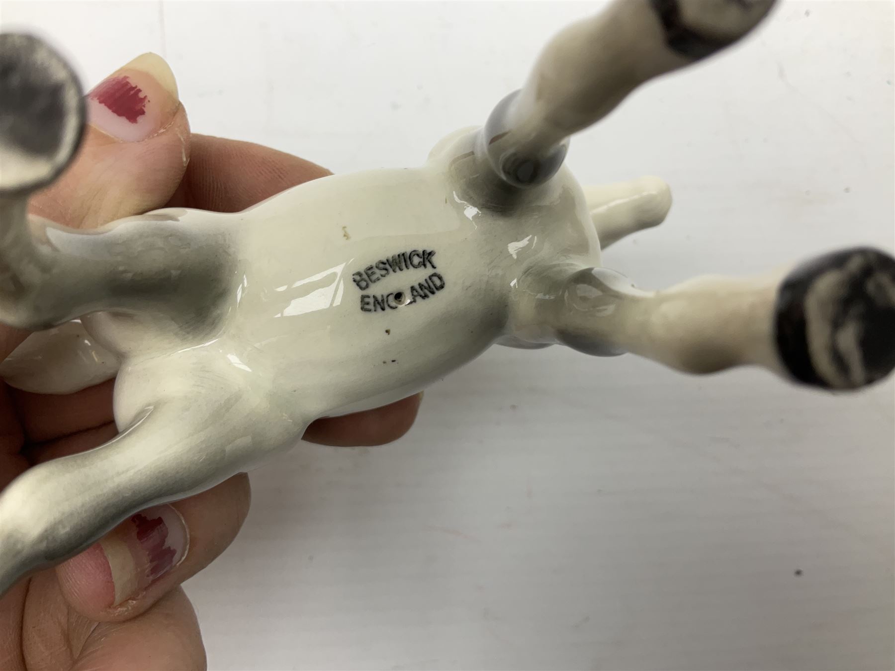 Seven Beswick figures of horses, including Connemara pony in grey no.1641, Arab in bay no.1265, large foal in grey no.947 etc, together with a Goebel figure of a horse (8)