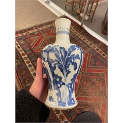 Chinese Kangxi porcelain vase, of baluster form painted in underglaze blue with seated figures and attendants, with fence, rockwork and leafy bamboo branches, with concentric circles mark beneath, H22.5cm