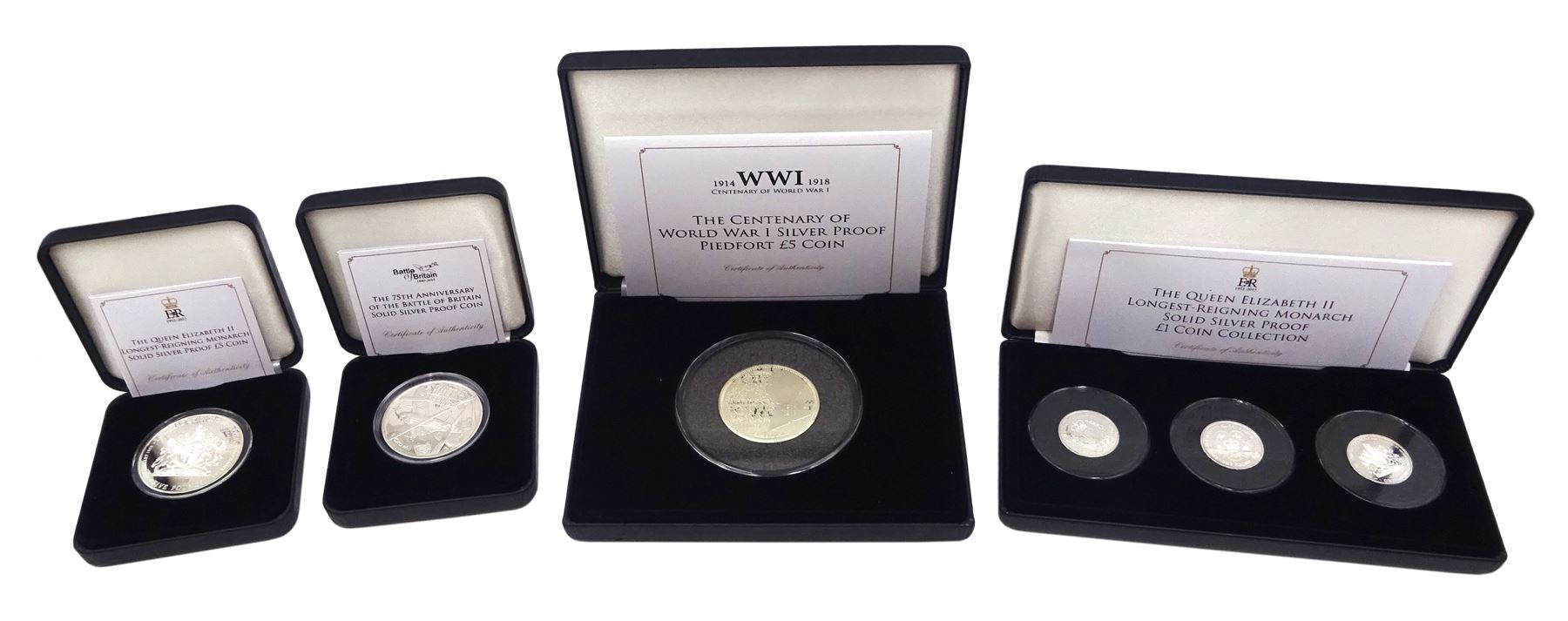 Queen Elizabeth II Tristan da Cunha 2014 silver proof piedfort five pounds, 2015 'Longest Reigning Monarch' silver proof five pounds and silver proof one pound three coin collection, and Isle of Man 2015 'Battle of Britain' silver proof crown, all cased with certificates