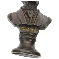 Three small bronze effect brass busts, modelled as composers Beethoven, Bach, and Wagner, each titled and raised upon a socle base, H14.5cm