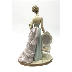 A Lladro figure, A Lady of Taste, H36.5cm.