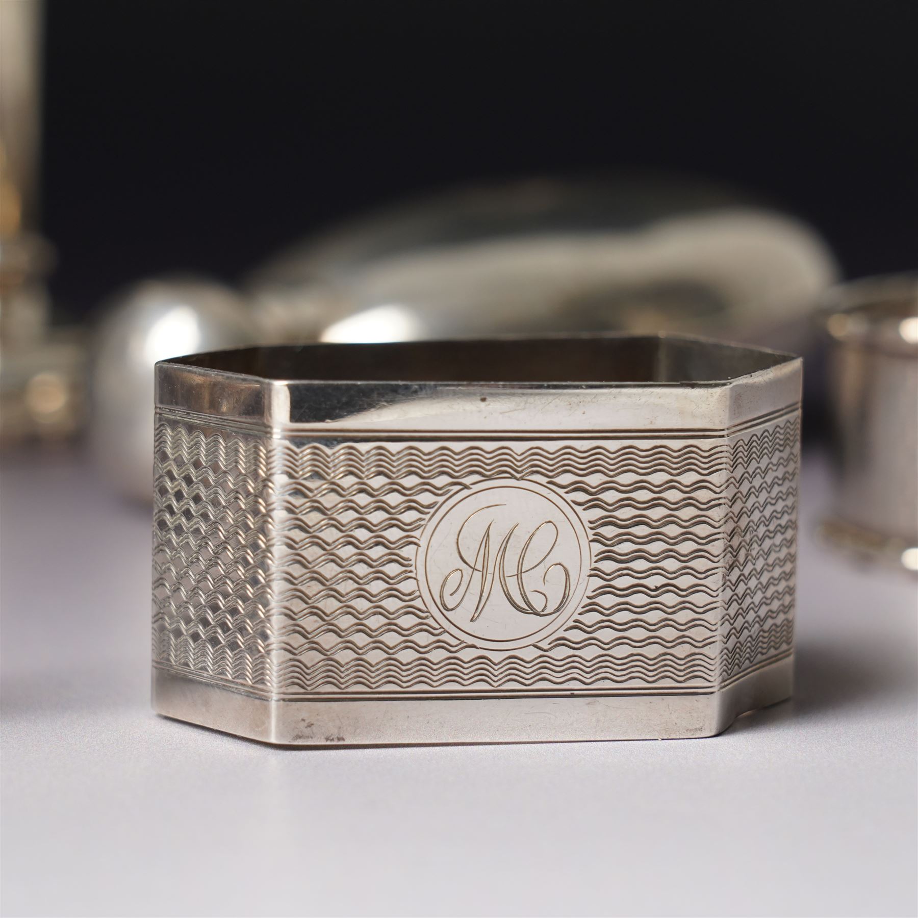 Small silver hip flask engraved with initials H9cm Sheffield 1988 Maker Hugh Crawshaw, silver pepper mill Sheffield 1975, globe scent flask with silver cover, four silver serviette rings, small silver vase and Norwegian silver salt