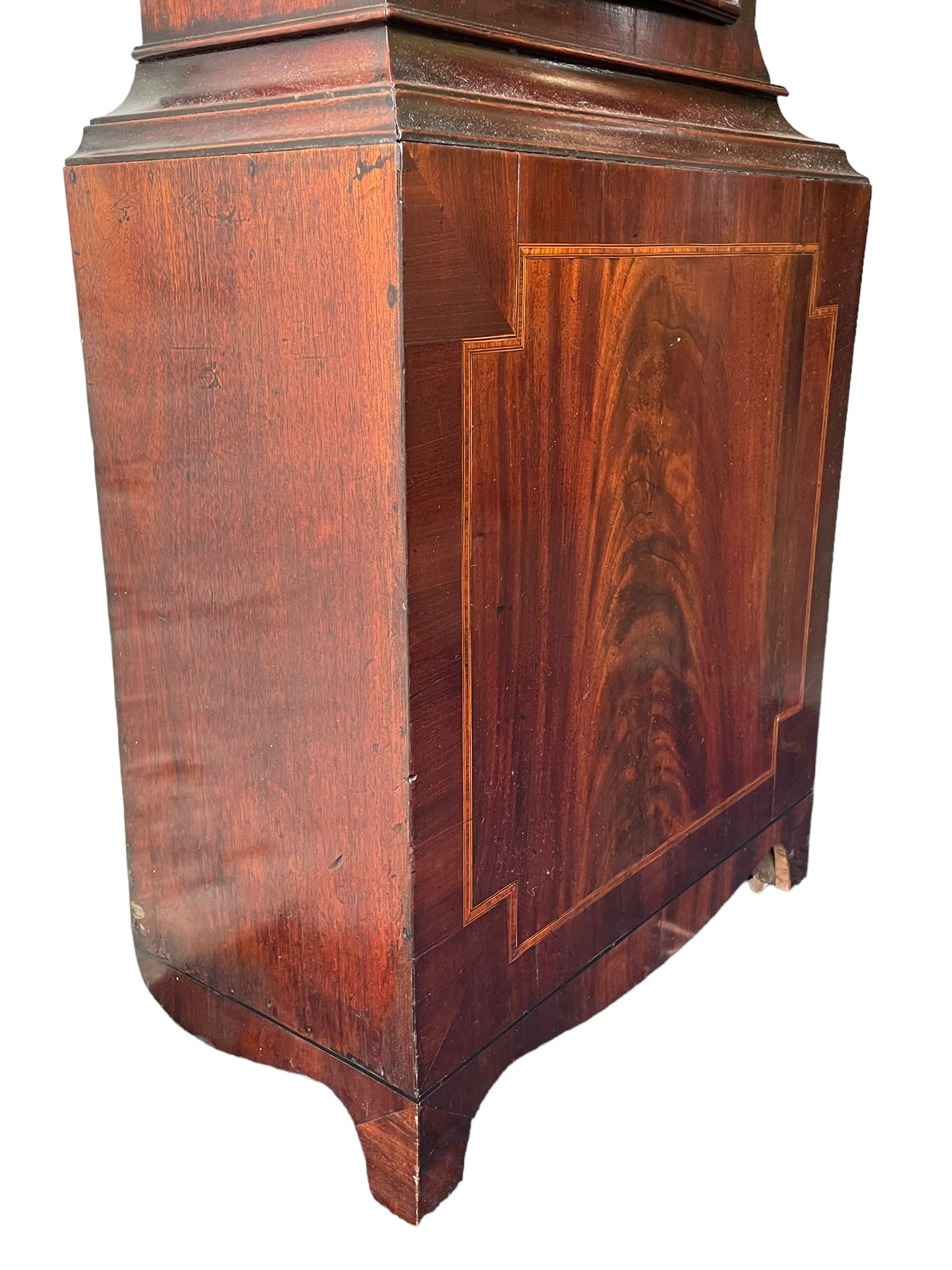 John Bancroft of Scarborough - a fine late George III 8-day mahogany longcase clock, with an elaborate pagoda pediment, brass ball and eagle finials and oval conch shell inlay, break arch hood door flanked by reeded pilasters with brass Corinthian capitals, trunk with inlaid canted corners and a break arch trunk door with 