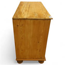 Victorian stripped pine chest, rectangular top over two short and two long drawers with turned wooden knob handles, on bun feet