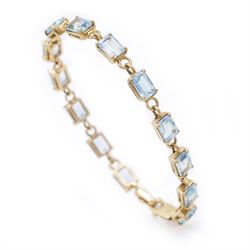 9ct gold Swiss blue topaz bracelet, set with thirteen rectangular cut topaz's, hallmarked