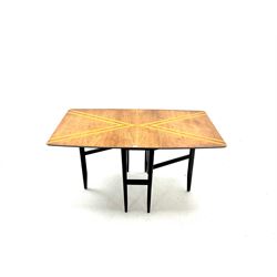 Mid 20th century retro teak drop leaf dining table with striped orange decoration on black painted base