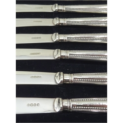  Set of siz silver handled tea knives by John Biggin, Sheffield 1928 and one other set by Frank Cobb & Co Ltd, Sheffield 1921  