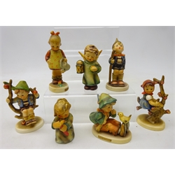  Seven Hummel Goebel figures, 'Singing Lesson', 'Apple Tree Boy', 'Little Gardener', 'Little Hiker' and three others (7)  