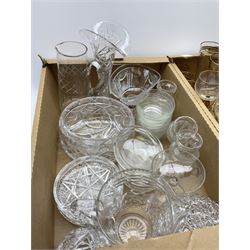 A large quantity of Victorian and later glass, comprising mostly cut glass, to include a pair of Victorian shaft and globe decanters and stoppers with slice cut decoration, H26cm, a large vase with star cut decoration, H30cm, smaller vase, H25.5cm, other various vases, bowls including pedestal examples, finger bowls, jugs, drinking glasses of various six and form including hock glasses and ale glasses, etc. 