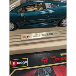 Two diecast cars, comprising Maisto 1:12 scale 1992 Jaguar XJ220 and a Burago 1:18 scale 1992 Dodge Viper RT10, both boxed